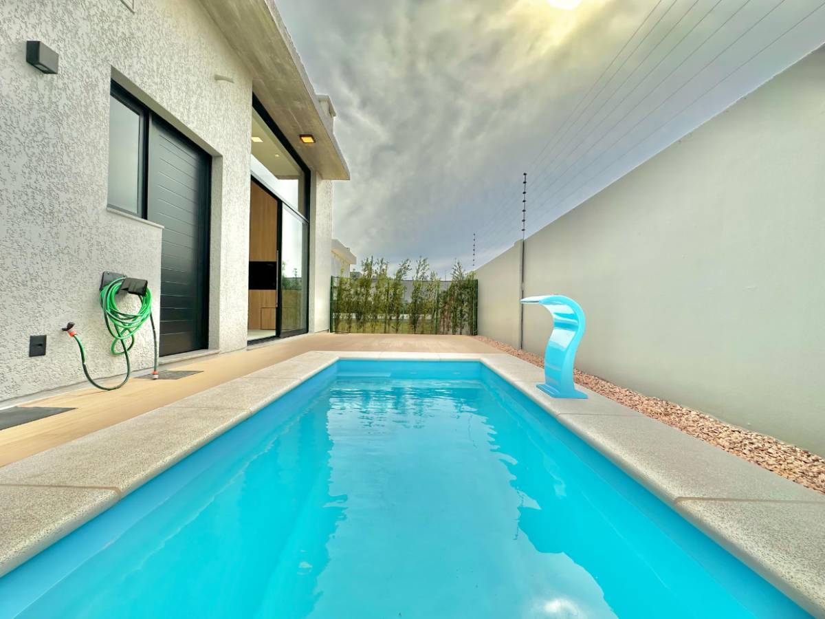 Casa em Condomínio 4 dormitórios para venda em Capão da Canoa | Ref.: 14622